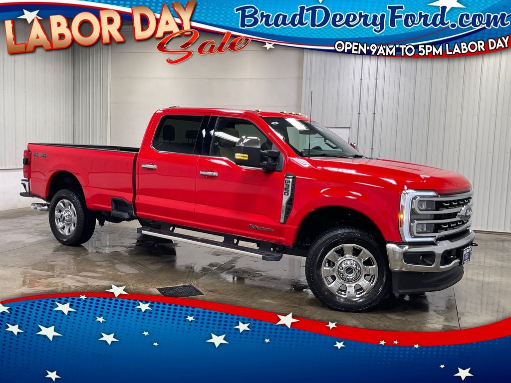 2026 Ford F-350SD Lariat in Race Red — front three-quarter view
